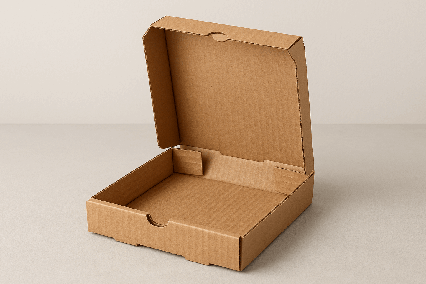 A realistic image of an open 8x8x2 inch square pizza box made from corrugated cardboard. The box has its lid open, revealing the spacious interior designed for small pizzas or flat food items. The sturdy fluted cardboard structure is visible around the edges, showing its durability despite the thin profile. The box is displayed against a neutral background, highlighting its practical design for food delivery and recyclable nature.