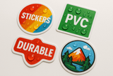 Durable PVC stickers with glossy waterproof finish in various shapes showing water resistance