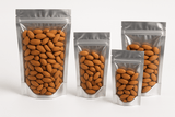 Transparent front and aluminum back pouches filled with almonds